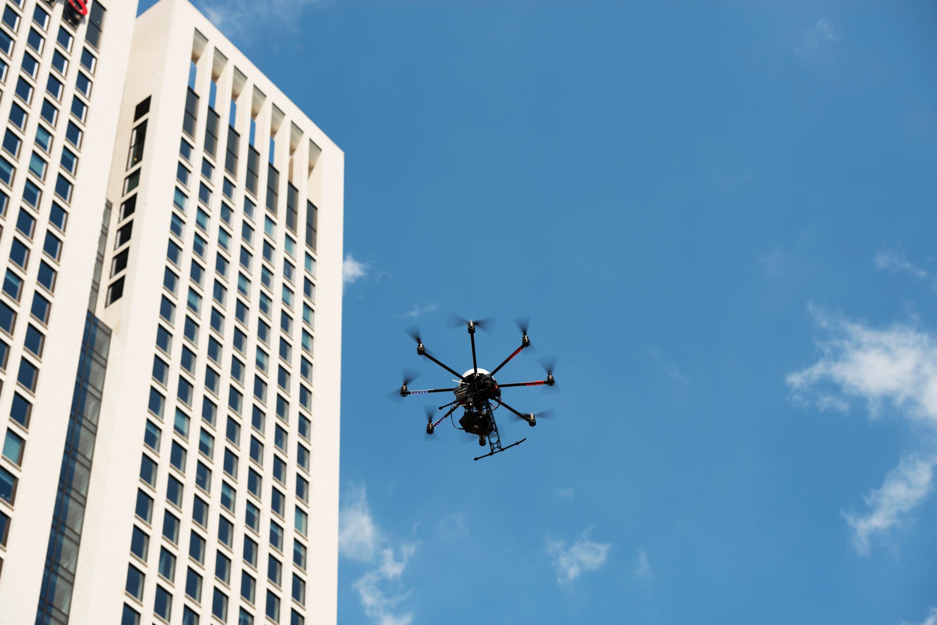 Octocopter Drone near an office building eye in the sky