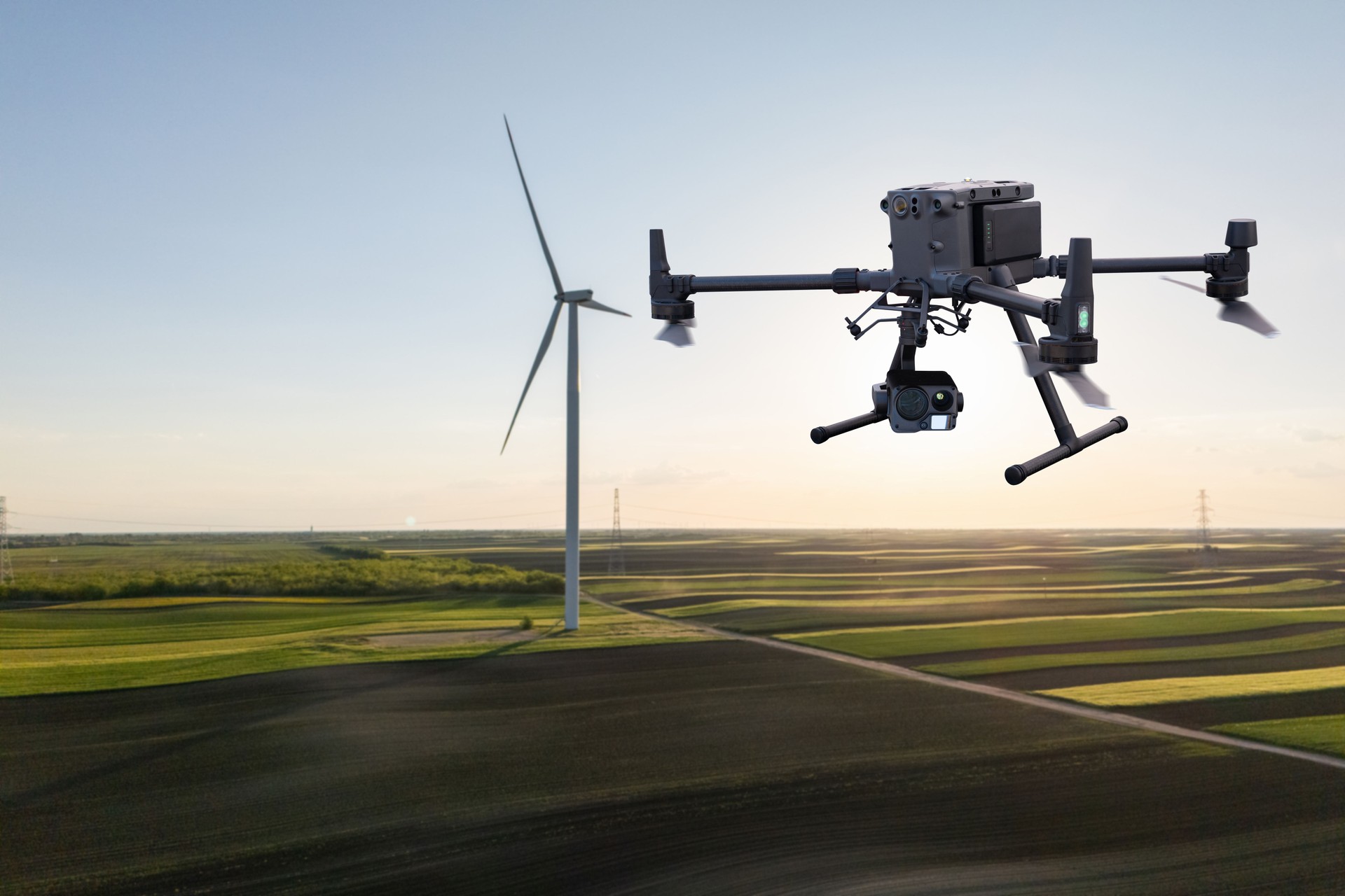 Industrial drone inspects wind turbines.